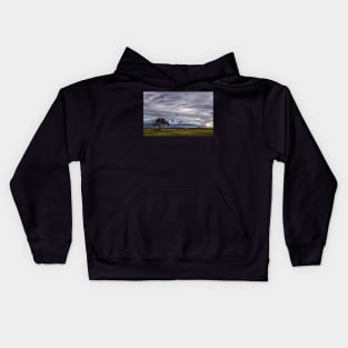 A Lone Tree Against the Storm Kids Hoodie